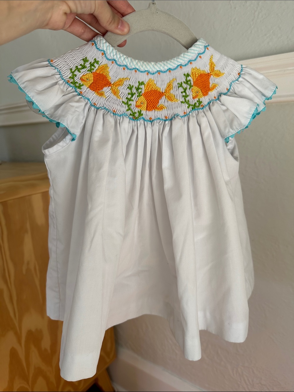 White Girls' Smocked Top with Orange Fish Embroidery